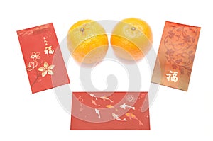 Red envelopes and a pair of mandarin oranges