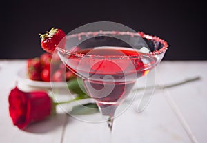 Red exotic alcoholic cocktail in clear glass