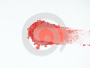 Red eye shadow stroke on white background