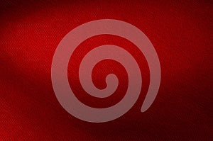 Red fabric background texture closeup.