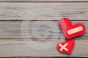 Red fabric hearts with bandage