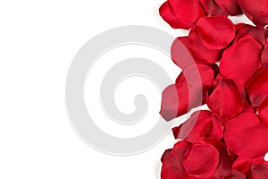 Red fabric rose petals border over white background top view from above - marriage, love, wedding or valentine`s day background