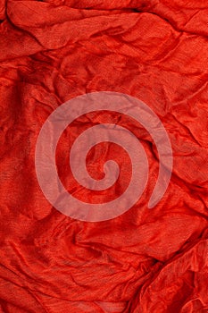 Red fabric texture in a close up view