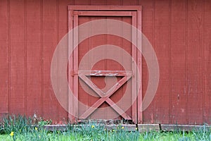 Red farm barn double door grass path