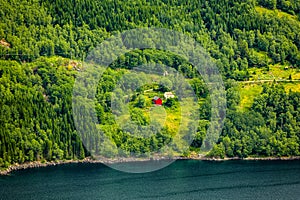 Red farm at Suldalsvatnet in Rogaland