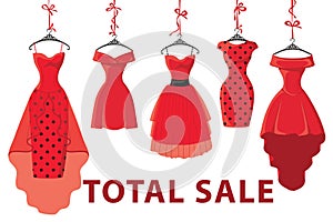 Red fashion women's dresses hang on ribbon.Big sale