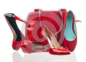 Red fashion women shoes and handbag over white