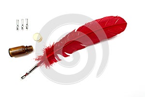 A red feather pen isolated on white background