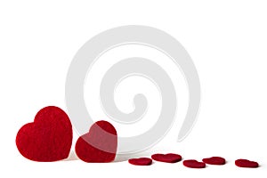 Red felt hearts isolated on a white background - valentines, love