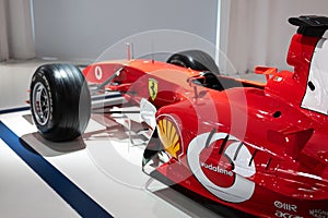 Red Ferrari Formula One F2003-GA car displayed in Modena Museum, Italy