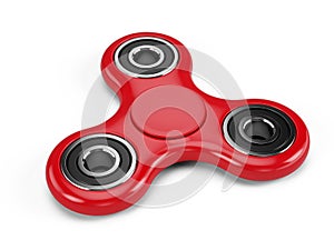 Red fidget spinner stress relieving toy isolated on white background