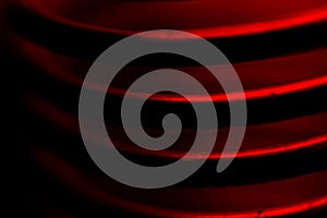 red fiery spiral in the dark closeup