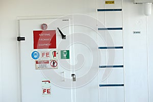 Red fire damper valve on a cruise ship