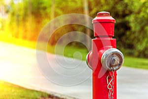 Red fire hydrant along the road close up