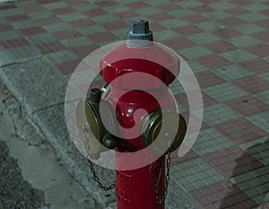 Red fire hydrant in the city street