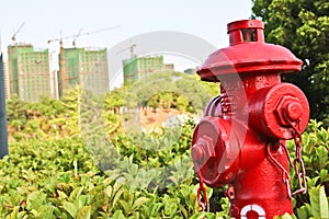 Red fire hydrant in students campus