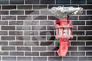 Red fire hydrant in the wall