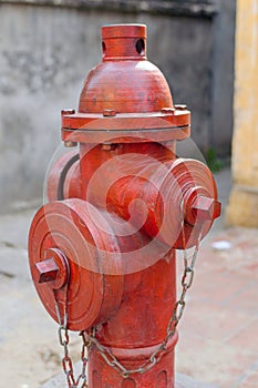 Red fire hydrant water pipe near the road