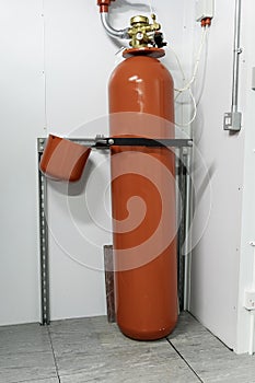 red fire suppression system cylinder