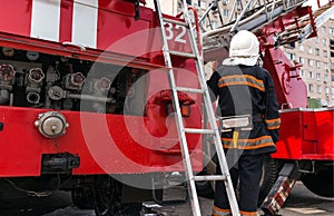 Red fire truck with a ladder