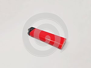 red firelighter with white background