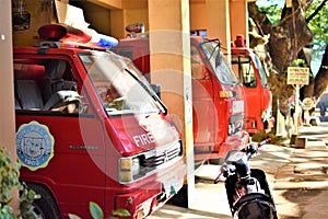 Red firetrucks in a fire station