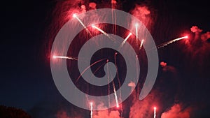 Red Fireworks exploding in the night sky