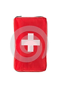 Red first aid medical kit bag over white flat lay top view from above