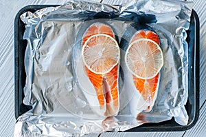 red fish dishes, healthy nutrition concept. Fish baked in foil. photo
