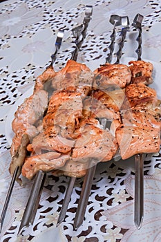 Red fish fried on skewers