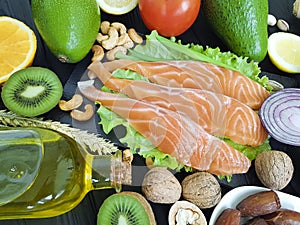 salmon fish, avocado organic dietary on a wooden healthy food assorted