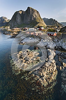 Red fishing hut (rorbu) on the Hamnoy island, Norway photo