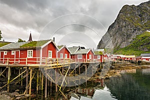 Red fishing huts called Rorbu in Reine, Norway