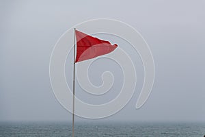 Red flag in Ris beach in Douarnenez