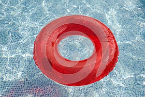 Red float floating in the pool