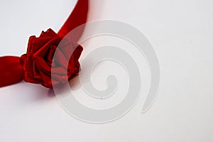 Red rose made by hand from satin ribbon