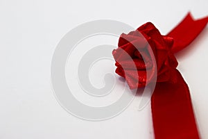 Red rose made by hand from satin ribbon