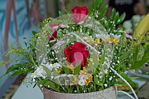 Red flower picture close up in the bouquet. The flower`s petal . Bouquet of fresh red roses . bouquet of red roses