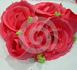 Red flower on a wedding cake