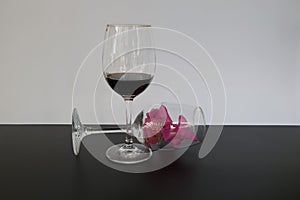 Red Flowers in Wine Goblet. Beautiful decoration