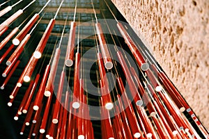 Red fluorescent tube lights hanging from the ceiling