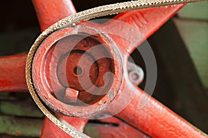 Red flywheel with belt