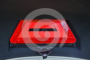 A red folded emergency sign lies in the trunk.
