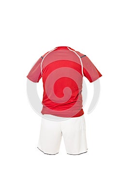 Red football shirt with white shorts