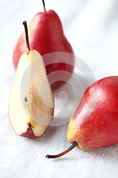 Red Forelle pears, one cut