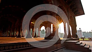 Red Fort interieur with sun flares photo