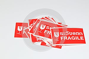 red Fragile stickers for stick on a parcel with thai language mean 