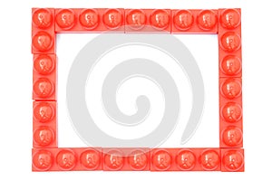 Red frame made of hildren`s designer for the development of motor skills and imagination