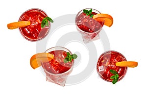 Red fresh drink with ice, grapefruit and mint isolated on white. Space for text or design