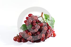 Red fresh grapes on the White background